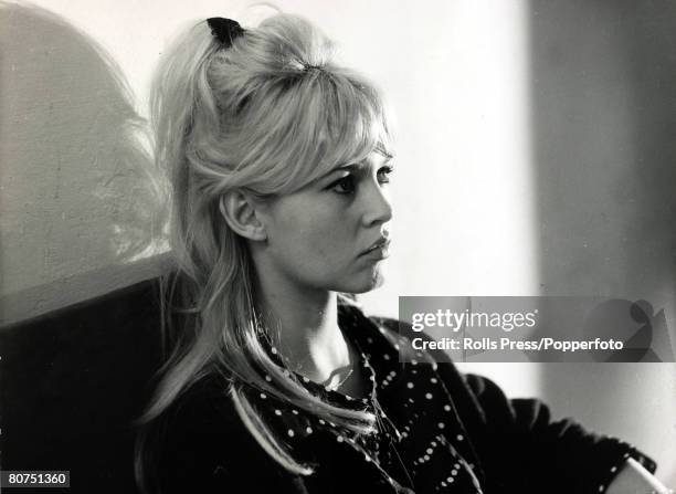 Cinema Personalities, pic: 30th January 1964, French film actress Brigitte Bardot, , pictured in a relaxed casual portrait, Brigitte Bardot, first...