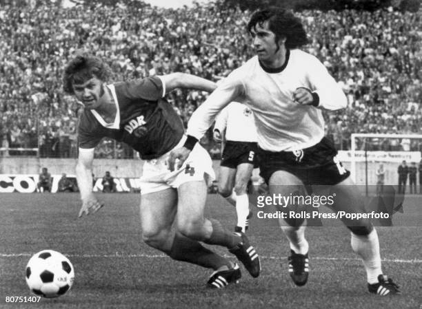 6th July 1974, 1974 World Cup Finals in Germany, Hamburg, Group Match, East Germany 1 v West Germany 0, West Germany's Gerd Muller right, moves away...