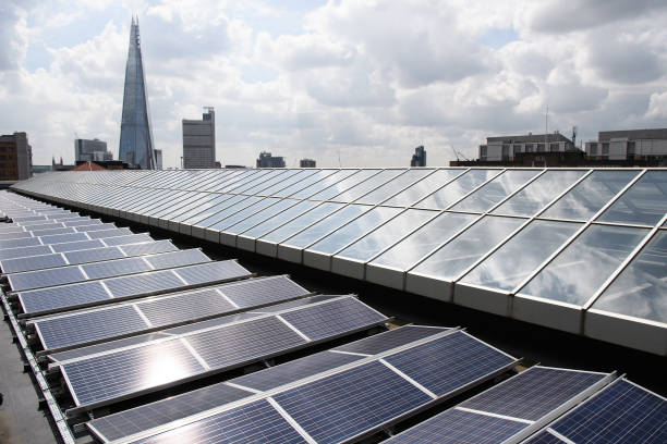Solar panels are seen on the top of the Tate Modern gallery on July 4, 2017 in London, England. As the solar industry marked its fourth annual "Solar...