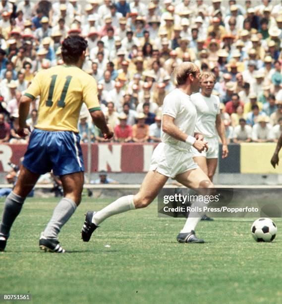 World Cup Finals, Guadalajara, Mexico 7th June England 0 v Brazil 1, England's Bobby Charlton gets away from Brazil's Rivelino during the two teams'...