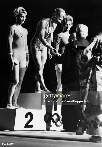 Medal winners from the Women's floor exercise gymnastics event at the 1964 Summer Olympics, from left, silver medallist Polina Astakhova of the...