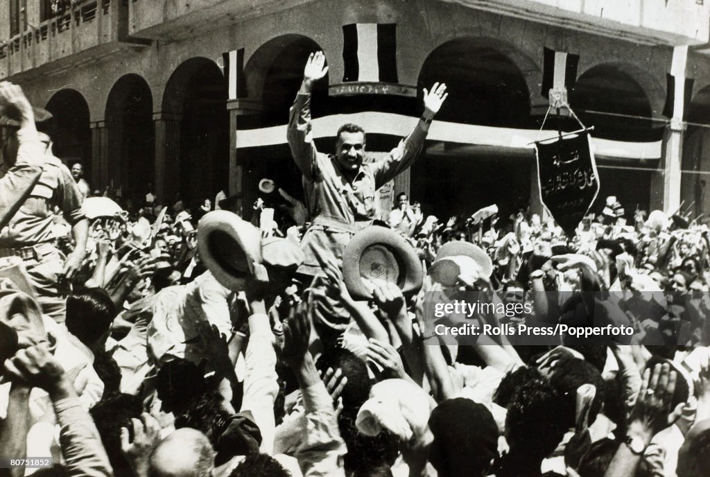 War and Conflict The Suez Crisis. pic: 1956. Egyptian Prime Minister Gamel Abdel Nasser is carried through the streets of Port Said after the British evacuation.