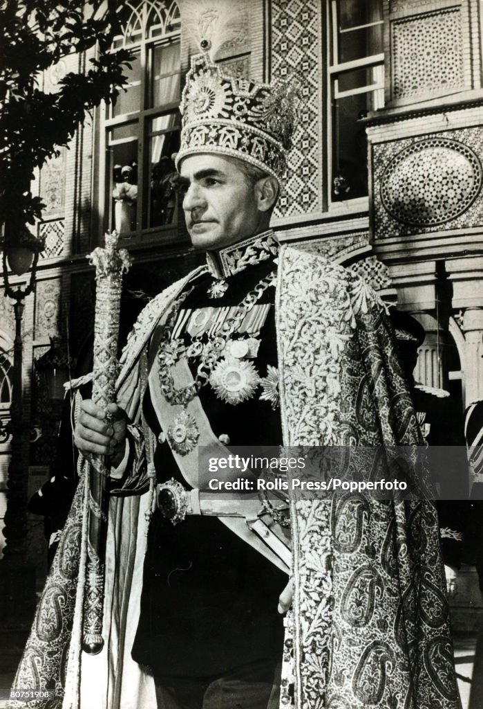 Foreign Royalty Personalities. pic: October 1967. The Shah of Iran (Persia) after the Coronation ceremony walks to the gold coach as he leaves the Golestan Palace. The Shah of Iran (1919-1980) succeeded his father in 1941, but was to leave Iran in 1979,