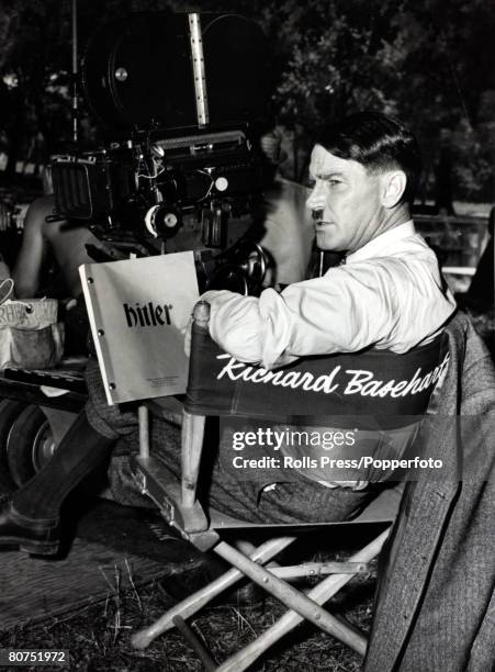 Cinema Personalities, pic: 1961, American actor Richard Basehart pictured on set in Hollywood as he plays Hitler in the film of the same name