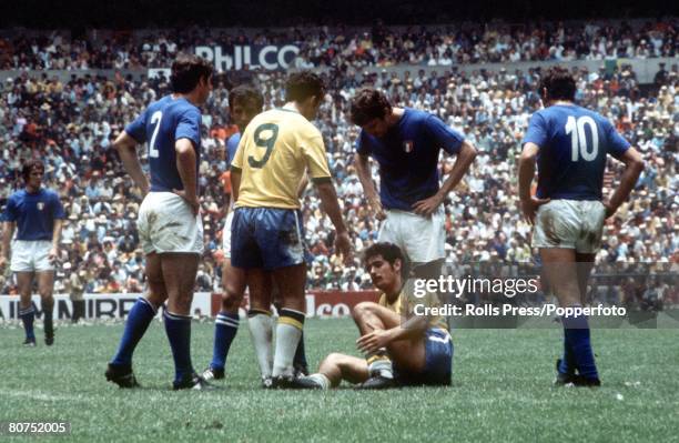 World Cup Final 1970, Mexico City, Mexico, 21st June Brazil 4 v Italy 1, Brazil's Tostao helps up teammate Rivelino after he was fouled by an Italian...