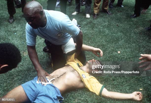 World Cup Final 1970, Mexico City, Mexico, 21st June Brazil 4 v Italy 1, Brazil's Rivelino is given treatment by his trainer after passing out during...