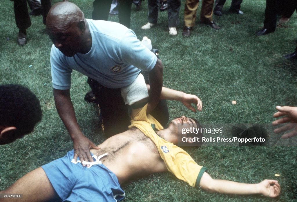 World Cup Final 1970 Mexico City, Mexico. 21st June, 1970. Brazil 4 v Italy 1. Brazil's Rivelino is given treatment by his trainer after passing out during the celebrations on the pitch followong Brazil's World Cup victory.
