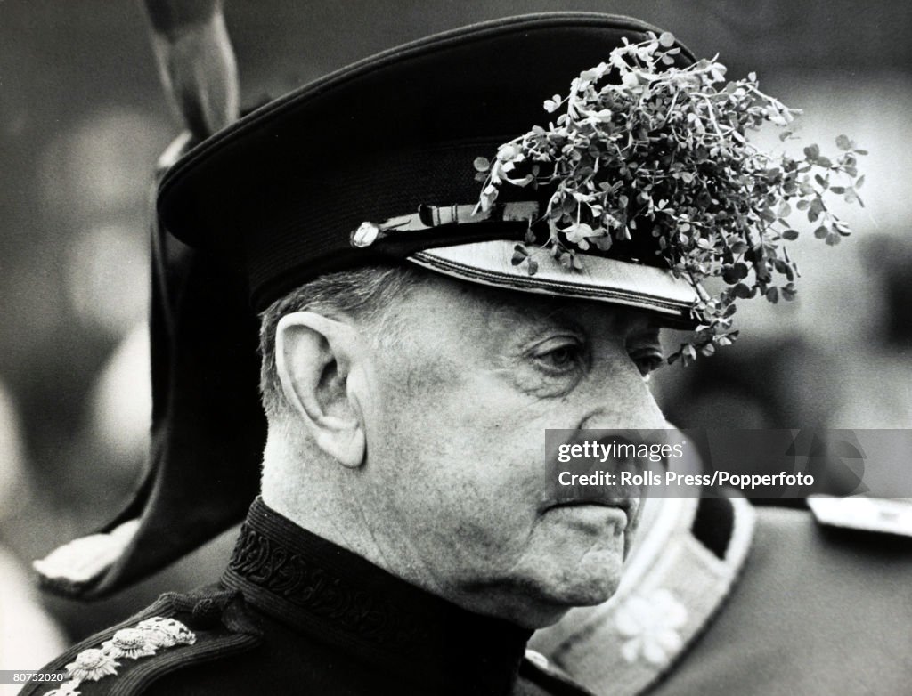 Military Politics. England. pic: 17th March 1966. Viscount Alexander, (1891-1969) pictured wearing shamrock sprigs in his cap at a St.Patrick's Day parade in London, where he distributed shamrock to the Irish Guards. A commander in World War II rising to