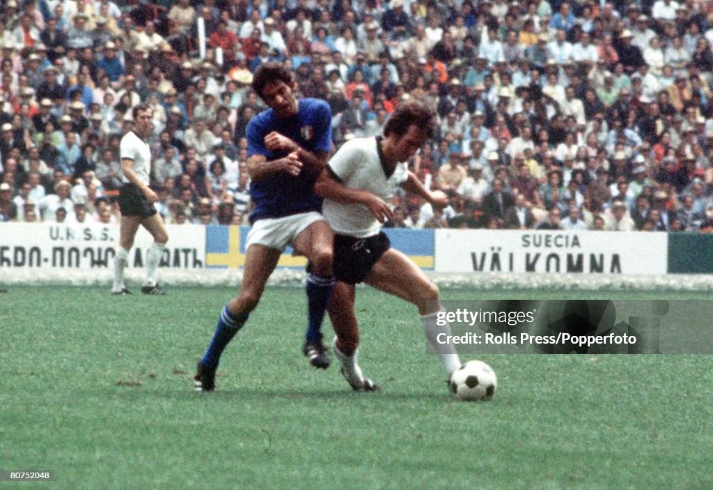 1970 World Cup Semi-Final, Mexico City, Mexico 17th June, 1970. Italy 4 v West Germany 3. An Italian defender and West German attacker fight for the ball during their semi-final match.