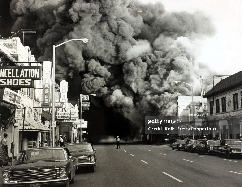 Race Riots U.S.A. pic: 1967. Detroit, Michigan. A huge pall of smoke pours from a burning building during race riots in the city.