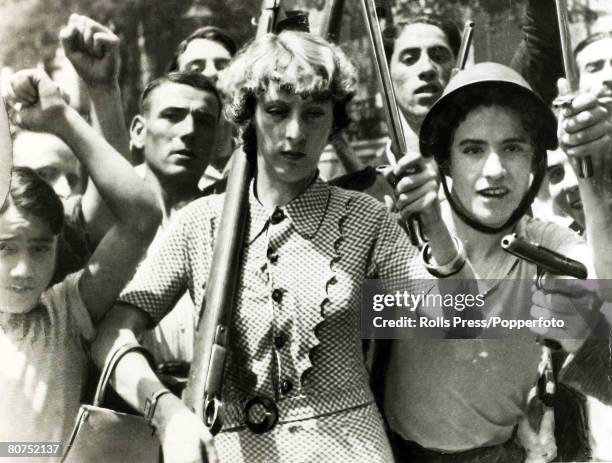 War and Conflict, Spanish Civil War , pic: 23rd July 1936, An armed woman leading a group marching through Madrid at the outbreak of the war, With...