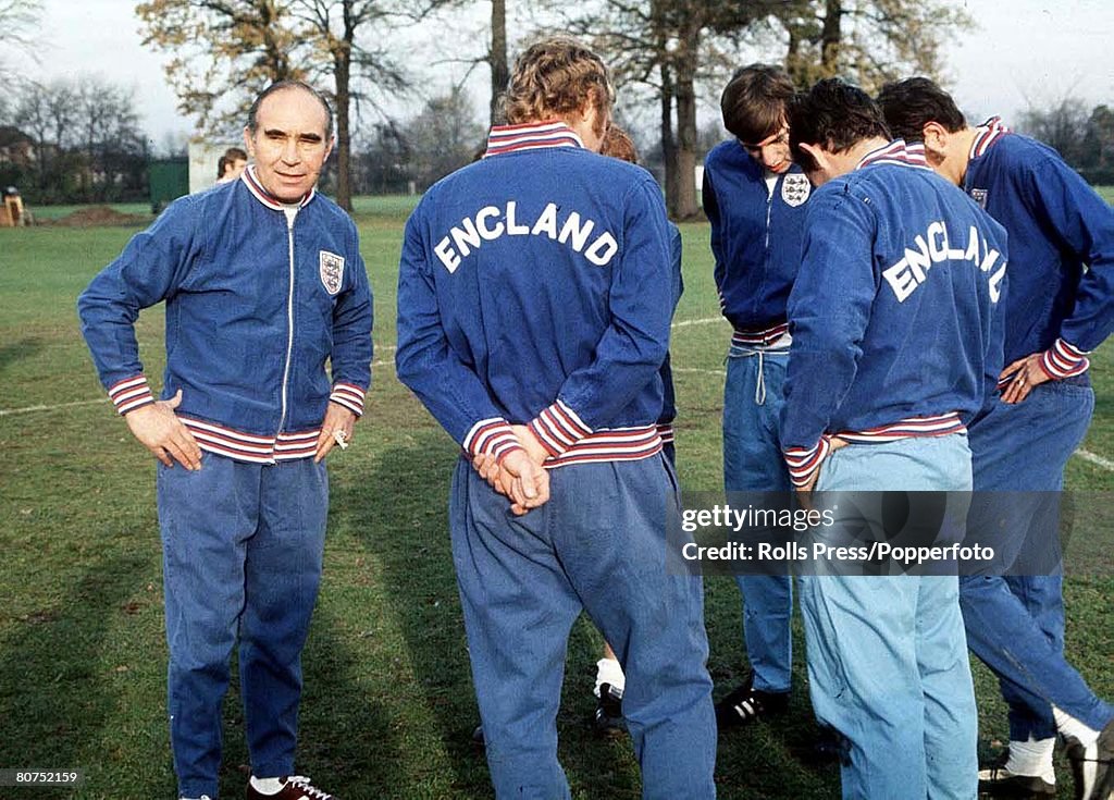 1966 England. England manager Sir Alf Ramsey pictured during a training session with a group of players.