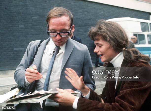 World Cup Finals, Mexico, England's Nobby Stiles signs an autograph for a fan on his team's arrival at Heathrow airport following the 1970 World Cup...