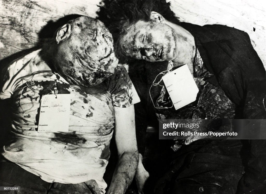 World War II Dictators. Milan. pic: April 1945. The dead battered body of Italian Fascist leader Benito Mussolini, alongside his mistress Clara Petacci.