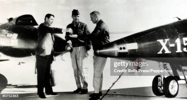 Space Exploration, pic: 1961, NASA test pilot Neil Armstrong receives the keys of a X-15 rocket plane from North American test pilot Scott...