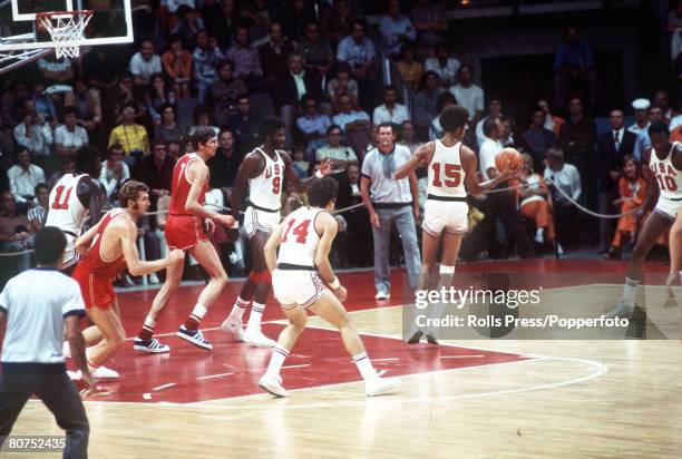 Action between the Soviet Union and United States teams in the final of the Basketball event at the 1972 Summer Olympics inside the...