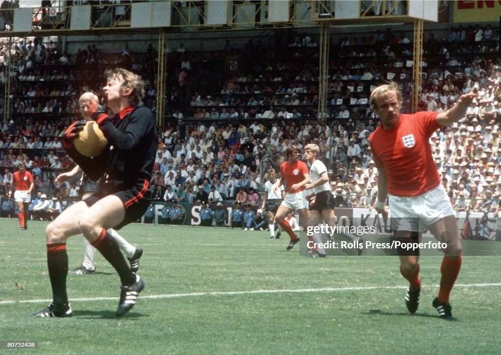 World Cup Quarter-Final, 1970 Leon, Mexico. England 2 v West Germany 3. 14th June, 1970. West Germany's goalkeeper Sepp Maier comes out to collect the ball as the referee blows the whistle for a foul by England's Francis Lee (R).