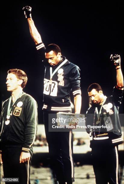 The medal presentation for the Men’s 200 metres final at the 1968 Summer Olympics, American athletes, gold medalist Tommie Smith and bronze medalist...