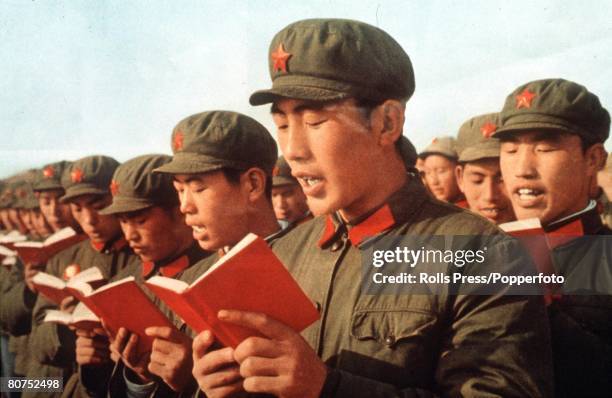 China's Red Army soldiers read from Mao Tse-tung's "Little Red Book"