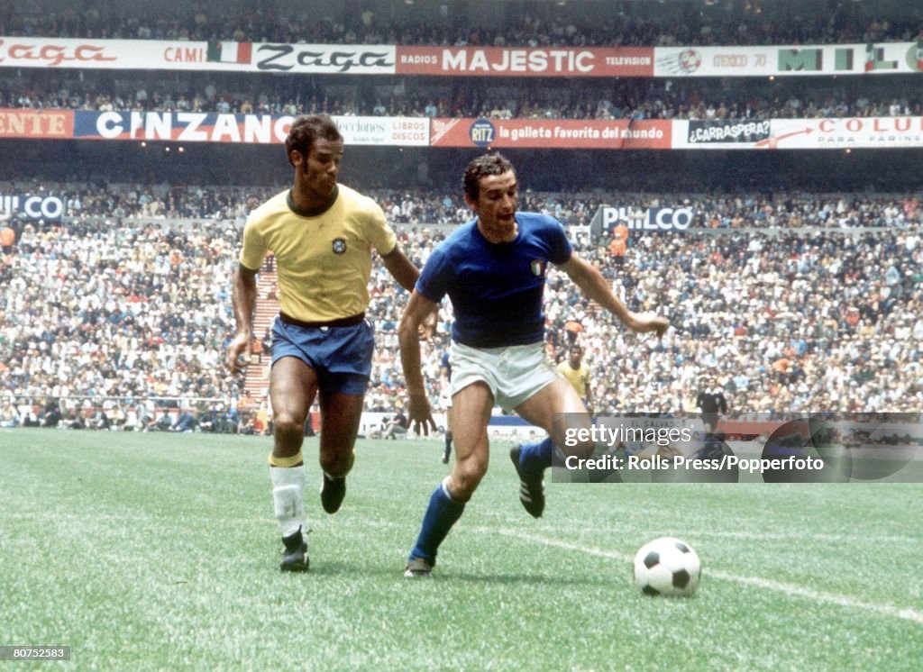 World Cup Final 1970 Mexico City, Mexico. 21st June, 1970. Brazil 4 v Italy 1. Italy's Luigi Riva takes on Brazilian defender Brito during the World Cup Final.