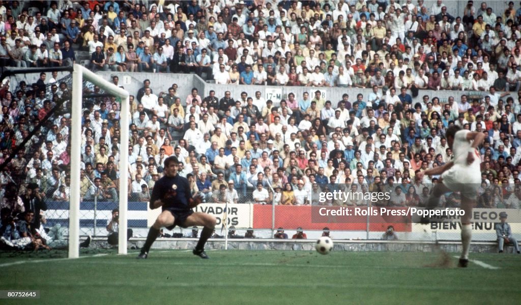 World Cup Quarter-Final, 1970 Leon, Mexico. England 2 v West Germany 3. 14th June, 1970. England's Geoff Hurst scores the game's only goal past romanian goalkeeper Stere Adamche.