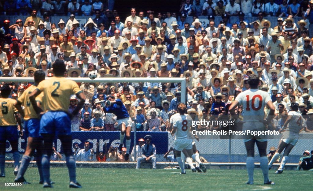 1970 World Cup Finals Guadalajara, Mexico 7th June, 1970. England 0 v Brazil 1. England goalkeeper Gordon Banks punches clear a Brazilian attack as his teammates Alan Ball (8) and Geoff Hurst (10) look on during the two teams' group Three match.