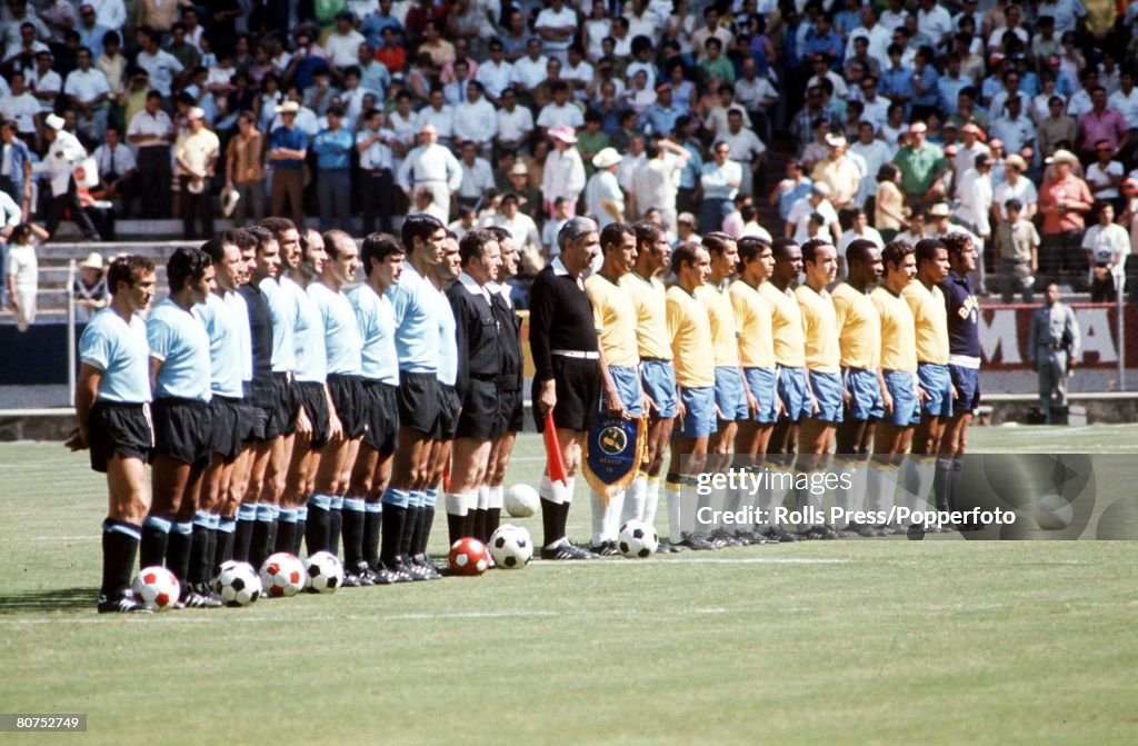 1970 World Cup Semi-Final Guadalajara, Mexico. 17th June, 1970. Brazil 3 v Uruguay 1. The two teams line up with officials as they listen to the national anthems before the match.