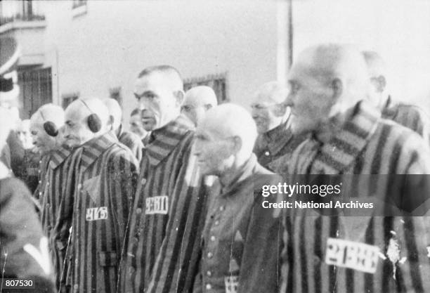 Prisoners stand in lines outdoors in the concentration camp at Sachsenhausen, Germany, December 19, 1938.