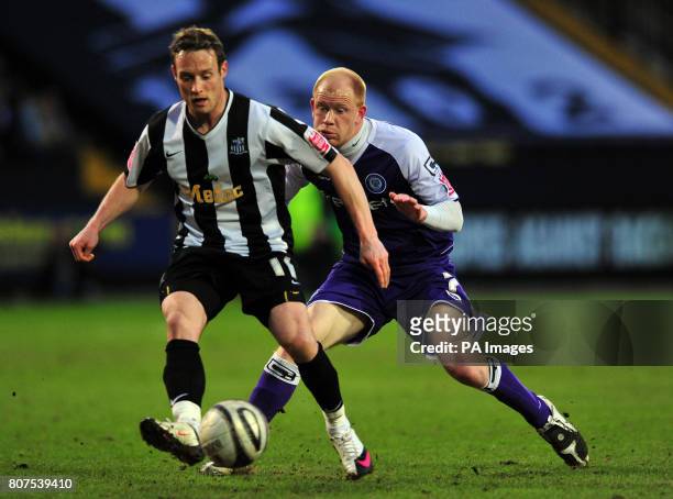Notts County's Ben Davies and Rochdale's Jason Kennedy battle for the ball during the Coca-Cola League Two match at Meadow Lane, Nottingham.
