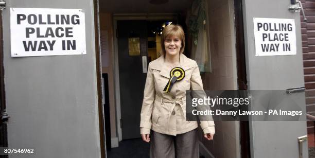 Deputy leader Nicola Sturgeon leaves Broomhouse Community Hall polling station in Glasgow East after casting her vote.