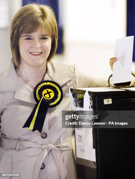 Deputy leader Nicola Sturgeon casts her vote at Broomhouse Community Hall polling station in Glasgow East.