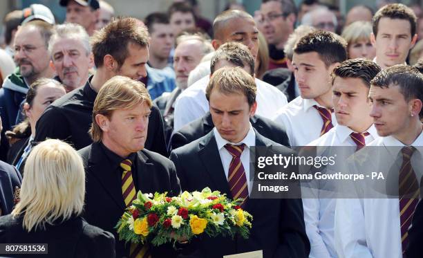 Former Bradford City manager and player Stuart McCall holds a floral tribute in the colours of Bradford City FC during the 25th Anniversary...