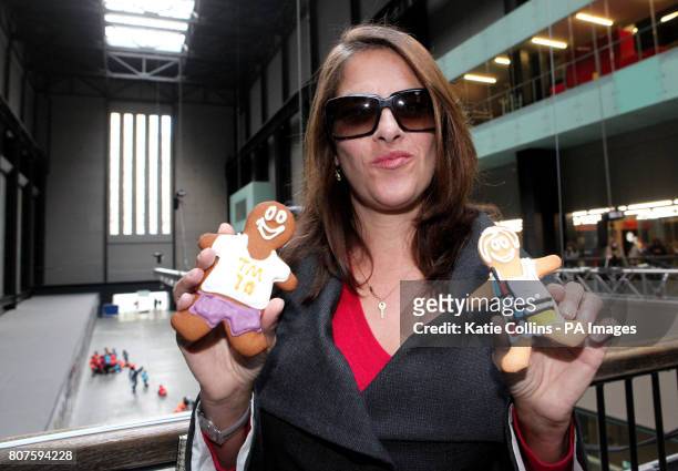 Artist Tracey Emin with two Tate Modern 10th birthday gingerbread men during the Tate Modern 10th birthday cake cutting event at the Tate Gallery,...