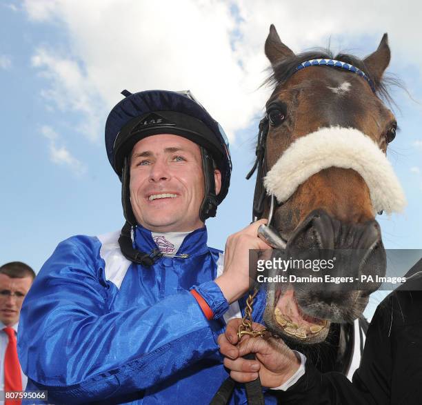 Jockey Pat Smullen with Bethrah after victory in the Ethihad Airways Irish 1,000 Guineas during the Etihad Airways Irish 1000 Guineas/Tattersalls...