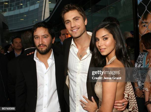 Director Hayden Schlossberg, actor Eric Winter and Actress Roselyn Sanchez arrive at the "Harold and Kumar Escape from Guantanamo Bay" Premiere at...