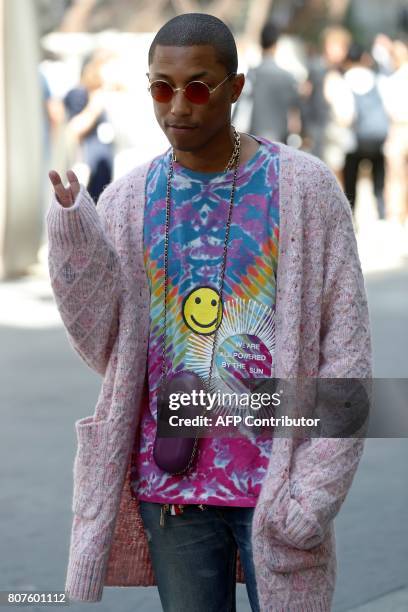 Singer Pharrell Williams poses during the photocall before Chanel 2017-2018 fall/winter Haute Couture collection show in Paris on July 4, 2017. / AFP...