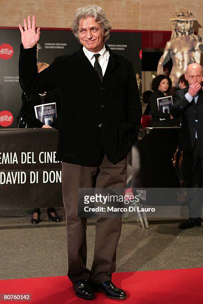 Italian actor Fabrizio Bentivoglio poses during the arrivals for the David di Donatello Movie Awards at the Auditorium della Conciliazione on April...