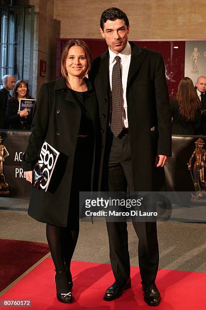 Italian actor Alessandro Gassman and his wife Sabrina Kaflitz pose during the arrivals for the David di Donatello Movie Awards at the Auditorium...