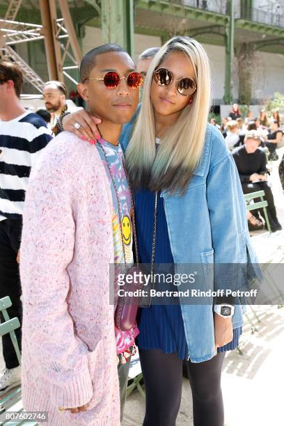 Singer Pharrell Williams and Helen Lasichanh attend the Chanel Haute Couture Fall/Winter 2017-2018 show as part of Haute Couture Paris Fashion Week...