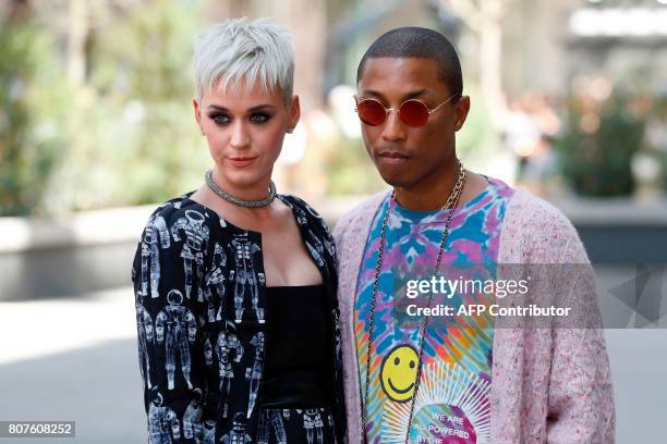 Singer Katy Perry and US singer Pharrell Williams pose during the photocall before Chanel 2017-2018 fall/winter Haute Couture collection show in...