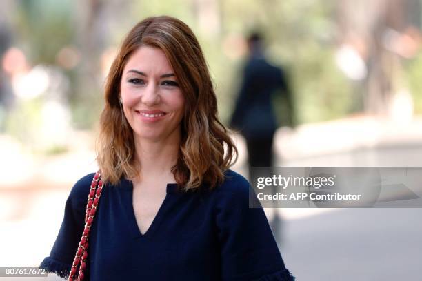 Director Sofia Coppola poses during the photocall before Chanel 2017-2018 fall/winter Haute Couture collection show in Paris on July 4, 2017. / AFP...