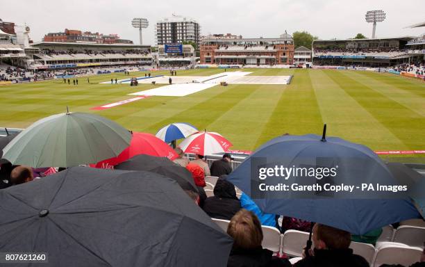 Wet weather delays the start of the first nPower Test Match at Lords, London.