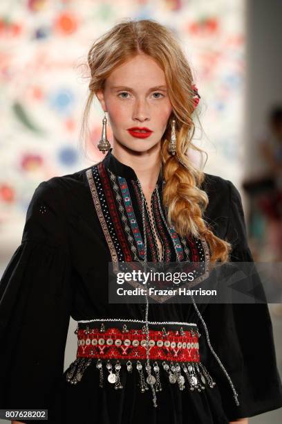 Model Sandra Hunke walks the runway at the Lena Hoschek show during the Mercedes-Benz Fashion Week Berlin Spring/Summer 2018 at Kaufhaus Jandorf on...