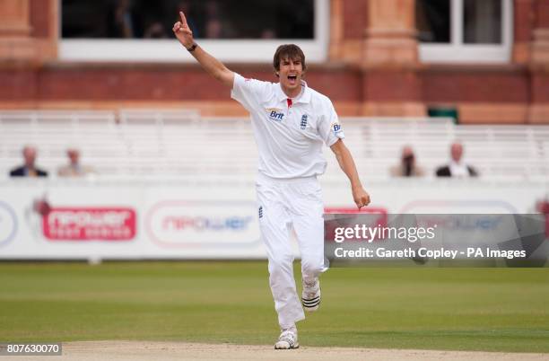 England's Steven Finn celebrates dismissing Bangladesh's Mohammad Ashraful during the first nPower Test Match at Lords, London.