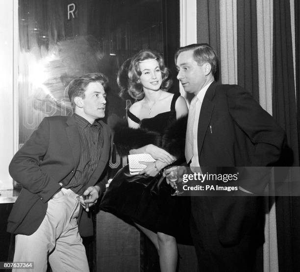 Star of the film Albert Finney co-star Shirley Anne Field and author Alan Sillitoe pictured in a London pub when attending a pre-premier party of...