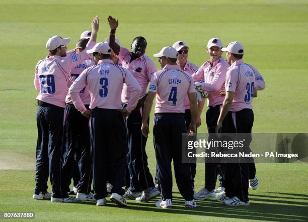 Middlesex Panthers' celebrate the wicket of Sussex Sharks Chris Nash for 2 runs during the Friends Provident T20 match at Lord's Cricket Ground,...
