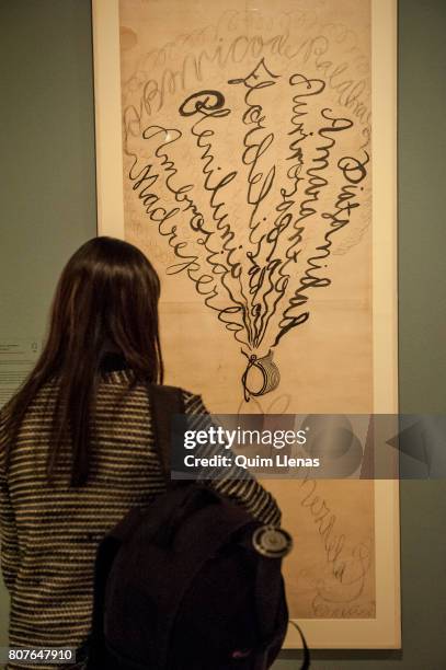 Visitor looks at 'Boceto del Abanico-poema' during the press preview of the exhibition 'Sonia Delaunay. Art, Design and Fashion' at...