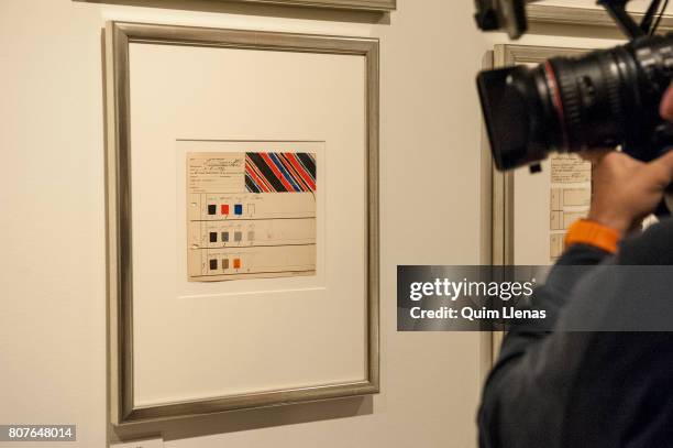 Camera films the 'Diseno de tejido simultaneo 205' during the press preview of the exhibition 'Sonia Delaunay. Art, Design and Fashion' at...