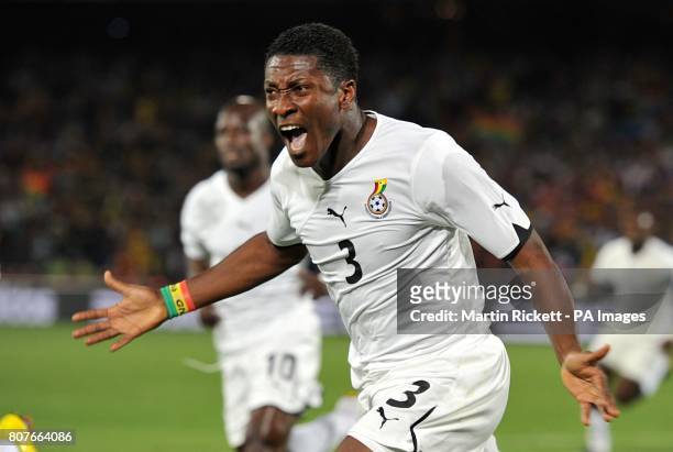 Ghana's Asamoah Gyan celebrates scoring his sides first goal of the game