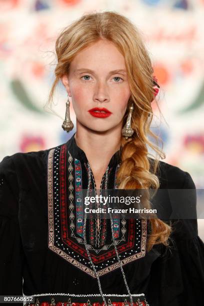 Model Sandra Hunke walks the runway at the Lena Hoschek show during the Mercedes-Benz Fashion Week Berlin Spring/Summer 2018 at Kaufhaus Jandorf on...